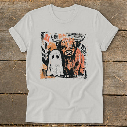 White t-shirt with distressed graphic of a Highland cow and a ghost.