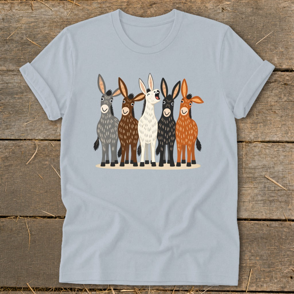 A light blue t-shirt with a graphic of five cartoon donkeys in various colors.
