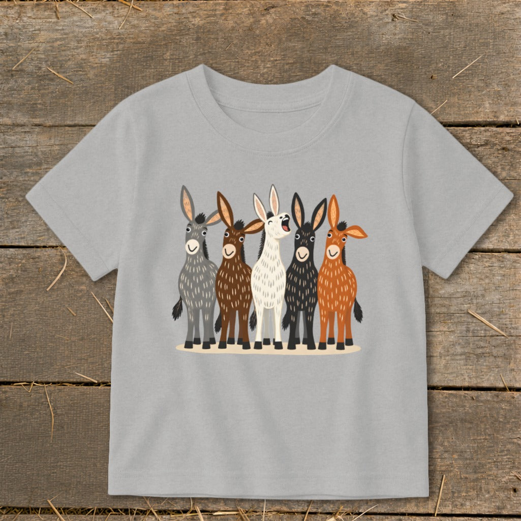 Light gray short-sleeve children's t-shirt printed with five illustrated cartoon donkeys in various colors.