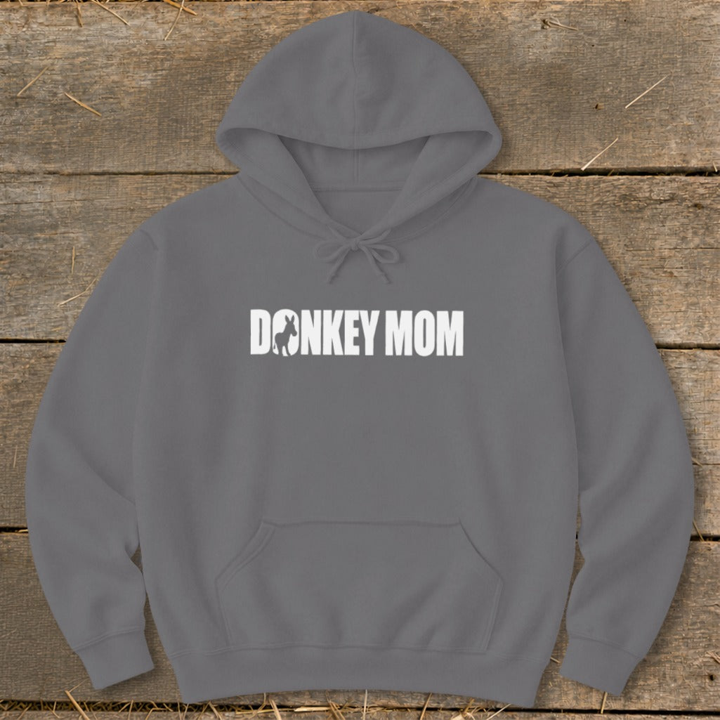 A dark gray hooded sweatshirt featuring the white text DONKEY MOM with a donkey silhouette inside the letter O.