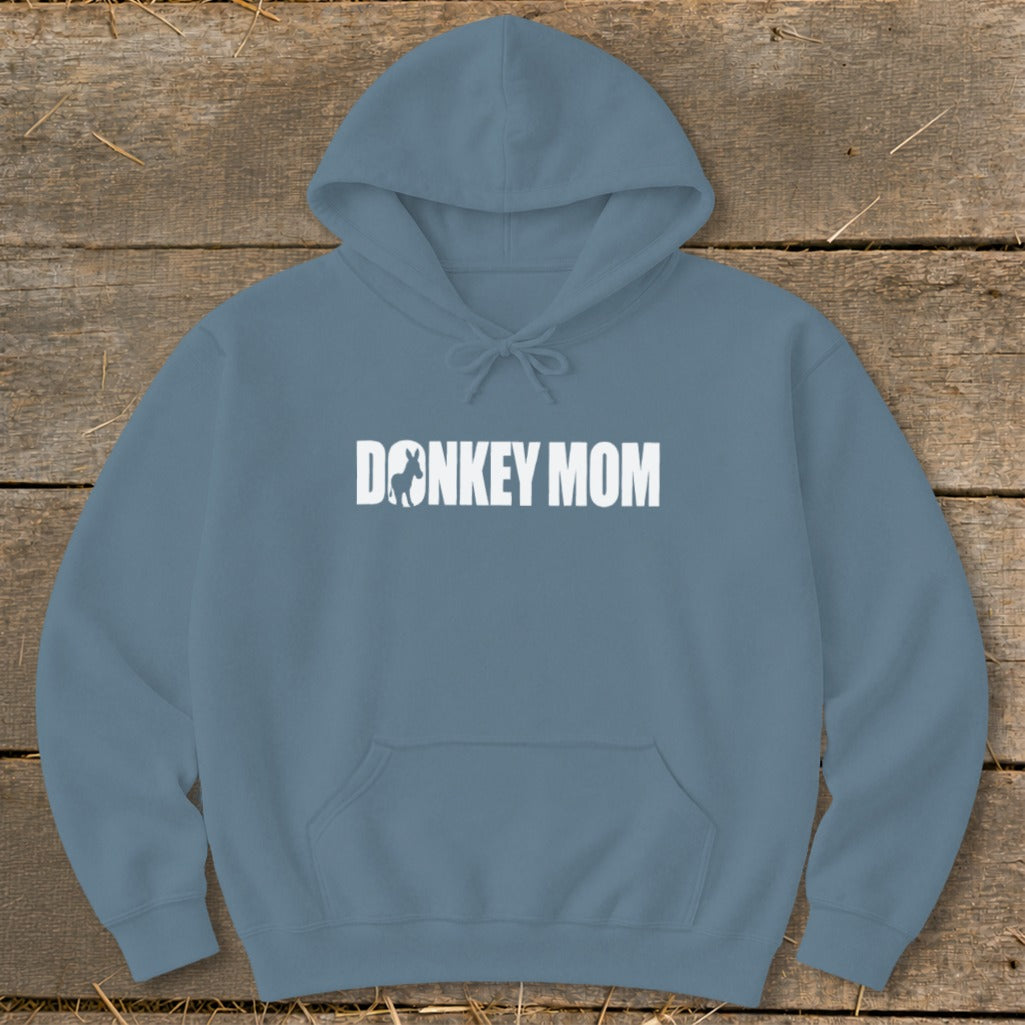 Slate blue hooded sweatshirt featuring white text that reads "DONKEY MOM" with a donkey silhouette inside the letter O.