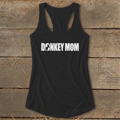 A black racerback tank top featuring the white text DONKEY MOM with a donkey silhouette replacing the letter O.