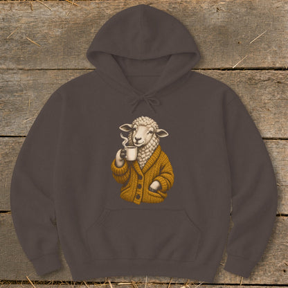 Dark brown hooded sweatshirt with an illustration of a sheep wearing a mustard-yellow cardigan holding a steaming white mug.