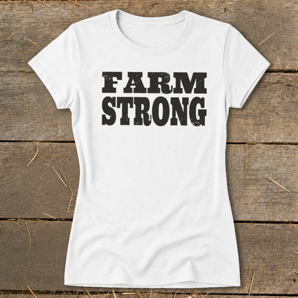 A white short-sleeved t-shirt with the words FARM STRONG printed in black across the chest.