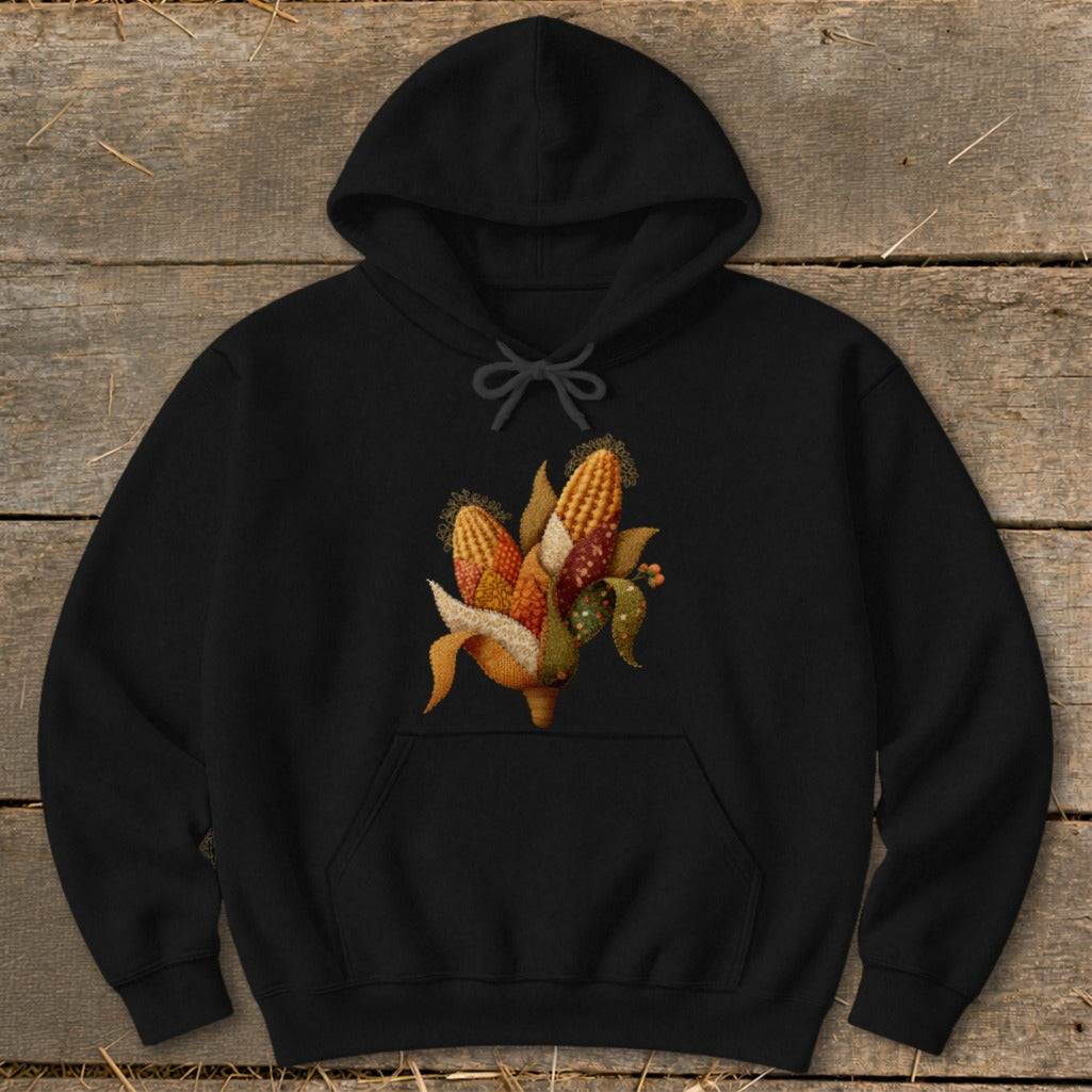 Black hoodie featuring an artistic depiction of two ears of corn with leaves.