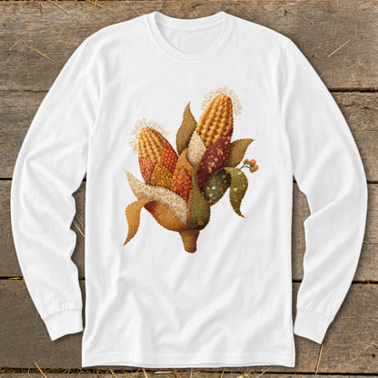 White long-sleeve shirt with a colorful cornucopia design featuring corn, leaves, and berries.