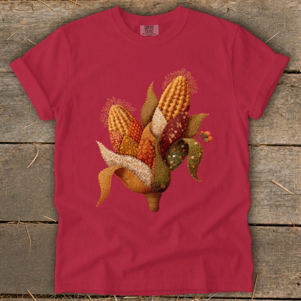 Red t-shirt with patchwork corn and leaves graphic, Comfort Colors tag.
