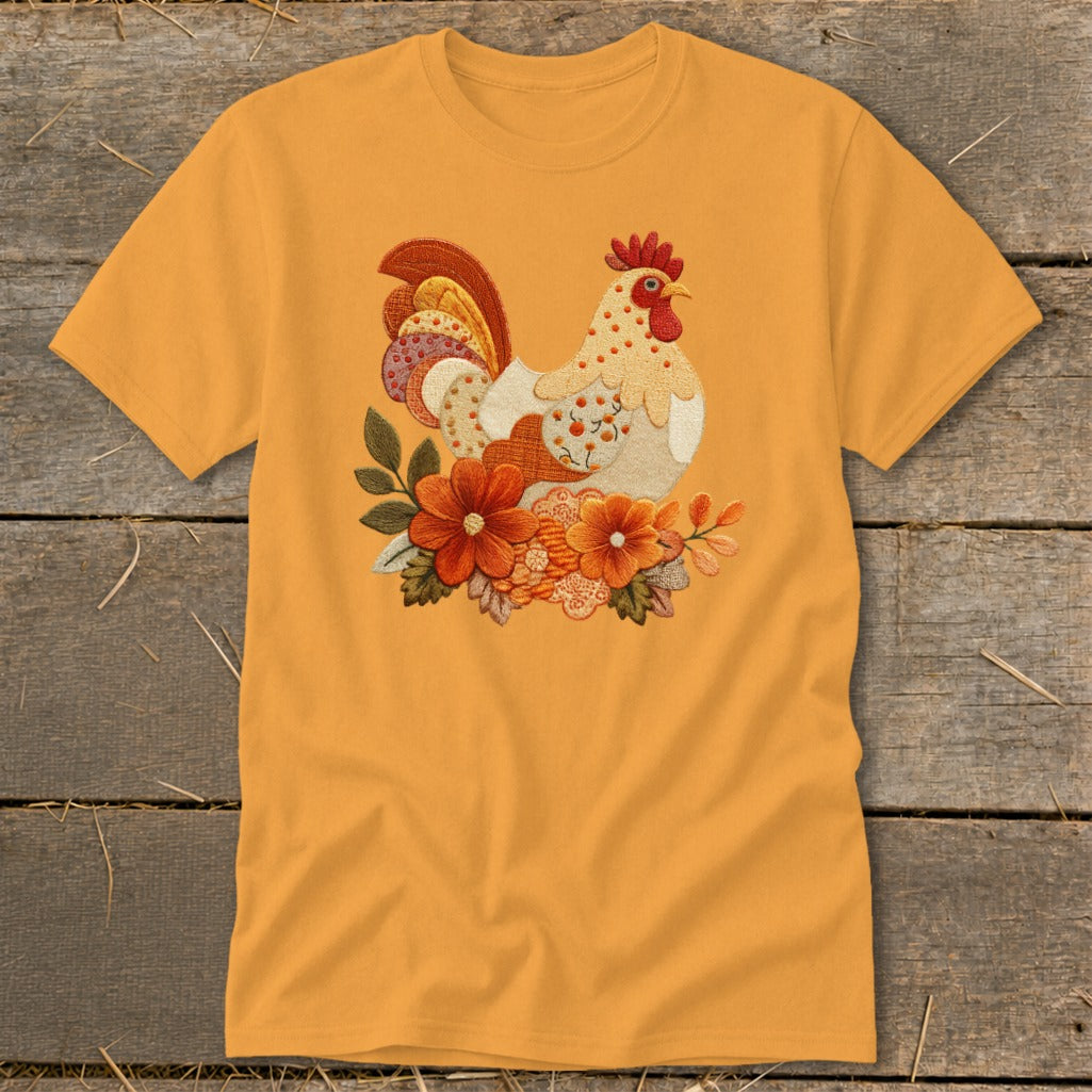 Mustard yellow crewneck t-shirt featuring a detailed embroidered rooster surrounded by autumn flowers on the chest.