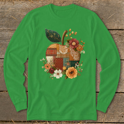 Green long-sleeve shirt with a patchwork apple graphic adorned with flowers.
