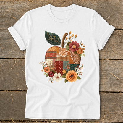 White t-shirt with patchwork apple design featuring autumn flowers and lace.