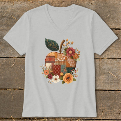 Gray v-neck t-shirt with a patchwork apple and floral design.