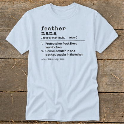 Light blue t-shirt with "feather mama" definition printed in black.