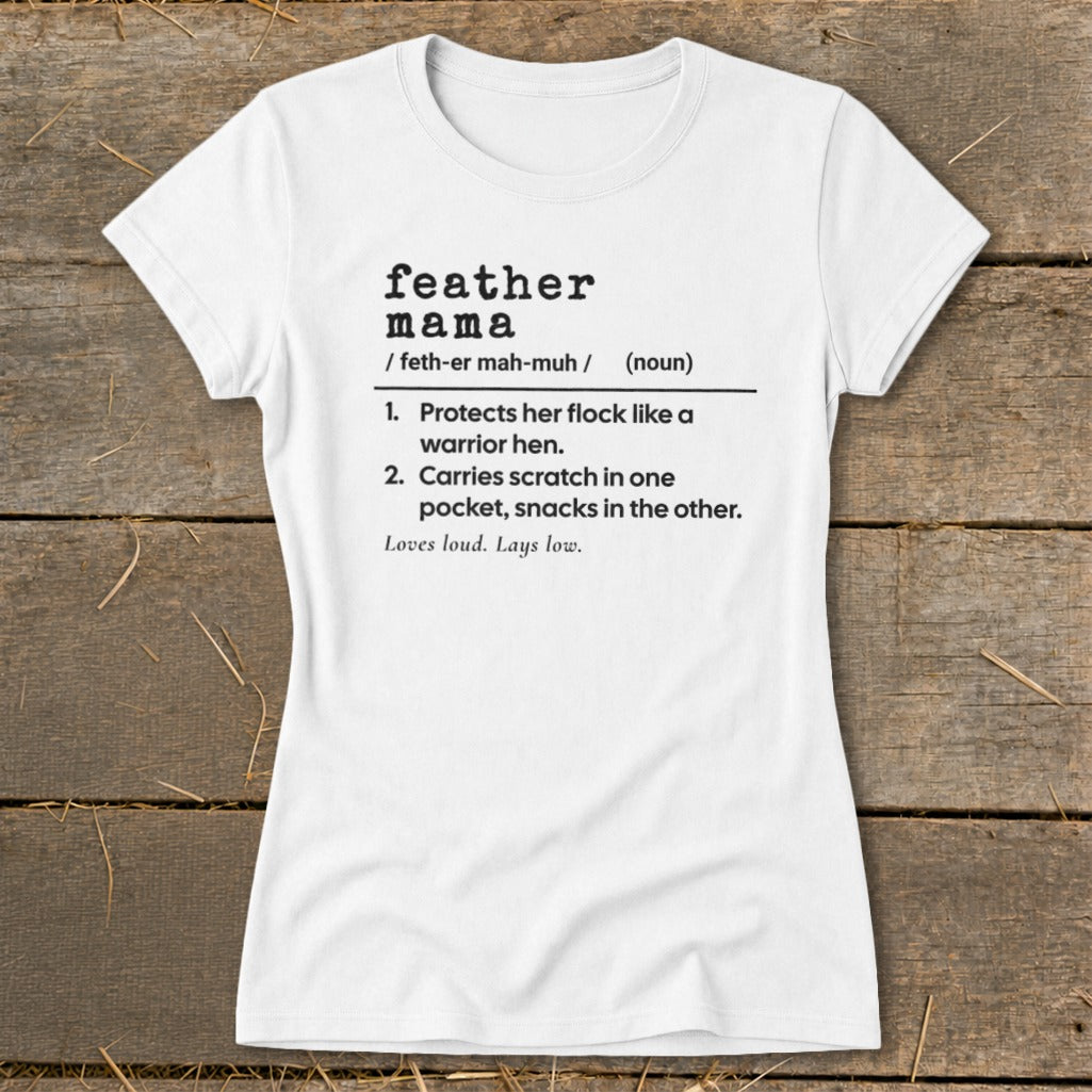 White t-shirt with "feather mama" definition: "Protects her flock like a warrior hen."