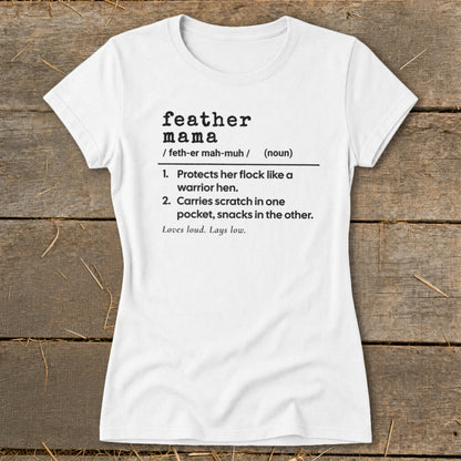 White t-shirt with "feather mama" definition: "Protects her flock like a warrior hen."