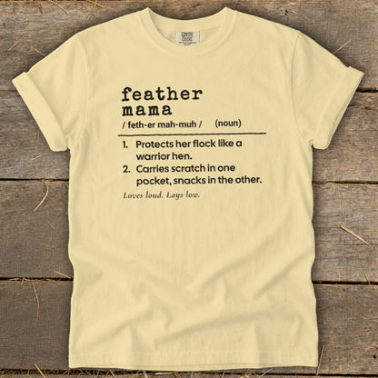 Light yellow t-shirt with "Feather Mama" definition and saying.