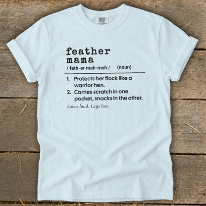 White t-shirt with "feather mama" definition and playful descriptions.