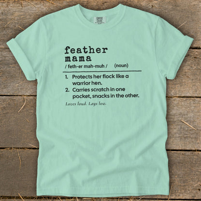 Light green t-shirt with "feather mama" definition including playful descriptions.