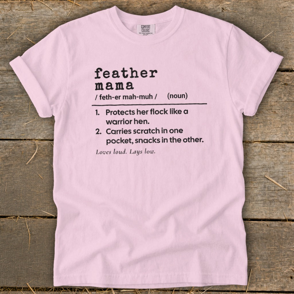Pink t-shirt with "feather mama" definition: "Protects her flock, carries scratch, loves loud."