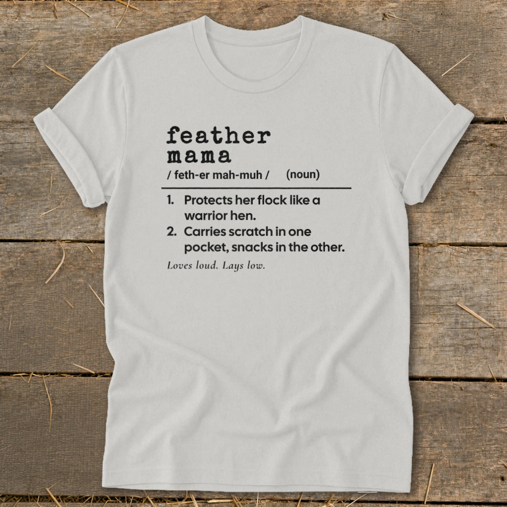 White t-shirt with "Feather Mama" definition including two numbered descriptions.