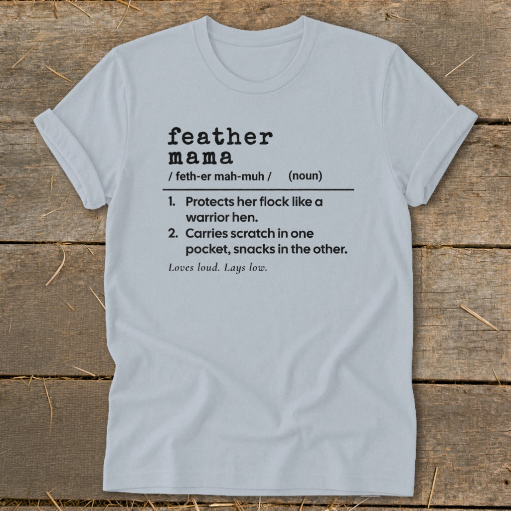 Light blue t-shirt with "feather mama" definition and related phrases.