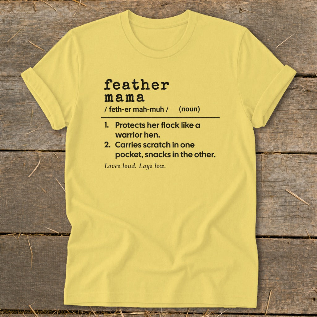 Yellow t-shirt with "feather mama" definition text and graphics.