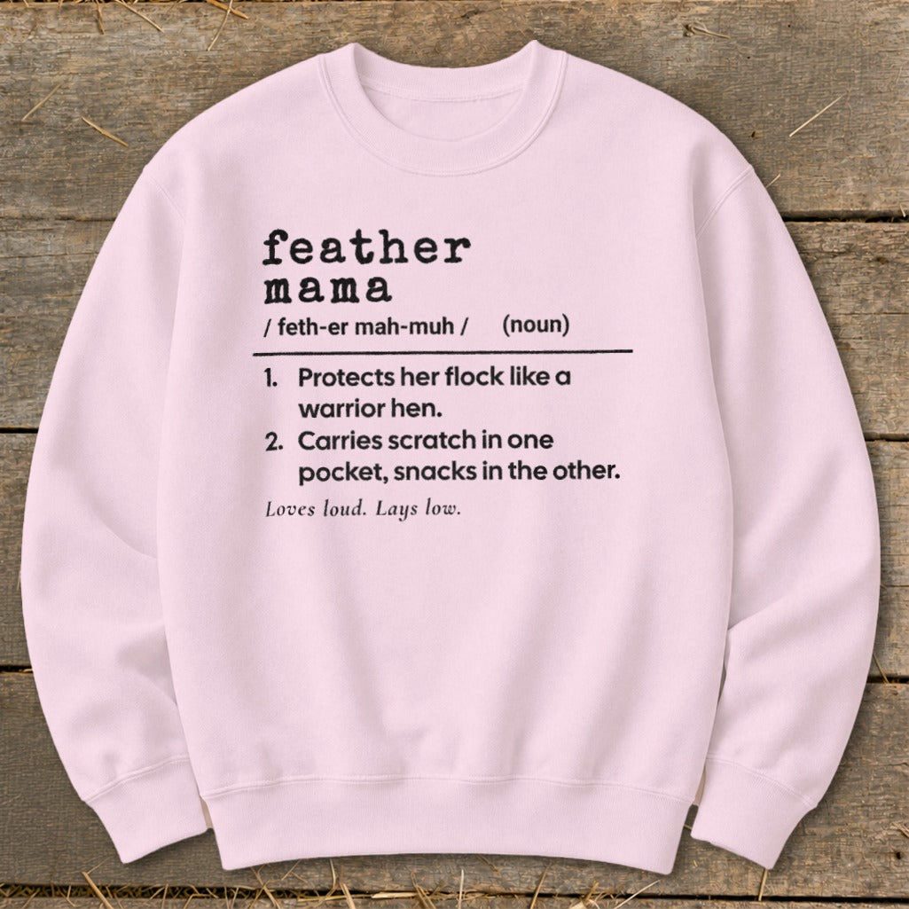 Light pink sweatshirt with "Feather Mama" definition and related phrases.