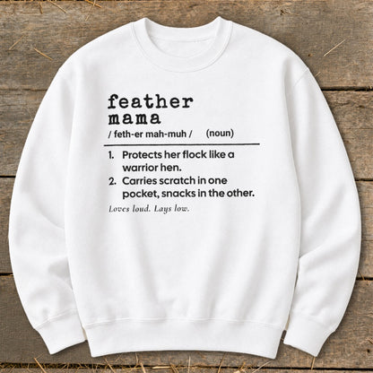 White sweatshirt with "feather mama" definition: protects flock, carries scratch and snacks.