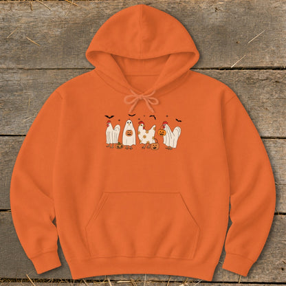 Orange hoodie with Halloween-themed chickens and ghosts graphic.