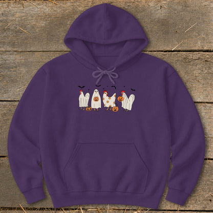Purple hoodie with Halloween chickens dressed as ghosts and holding pumpkins.