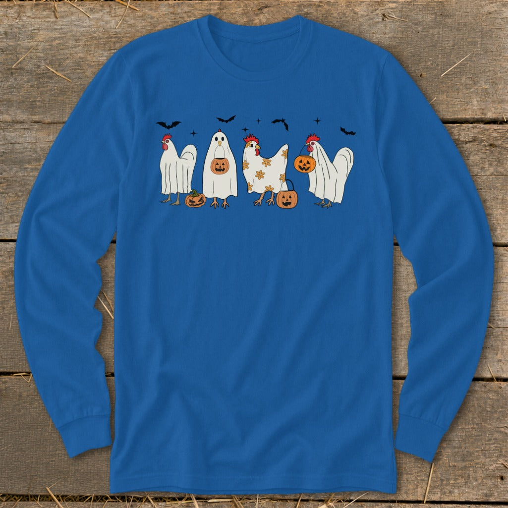 Blue long sleeve shirt with four chickens in Halloween costumes and pumpkins.