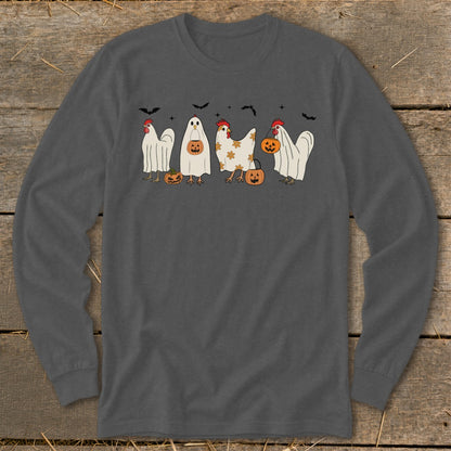 Cute chickens in ghost costumes and pumpkins with bats above.