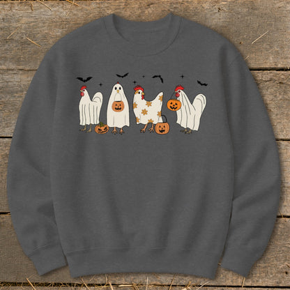 Four chickens dressed as ghosts with pumpkins and bats, on a dark gray sweatshirt.
