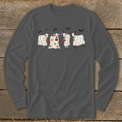 Four cows in ghost costumes hold pumpkins with bats and stars above.