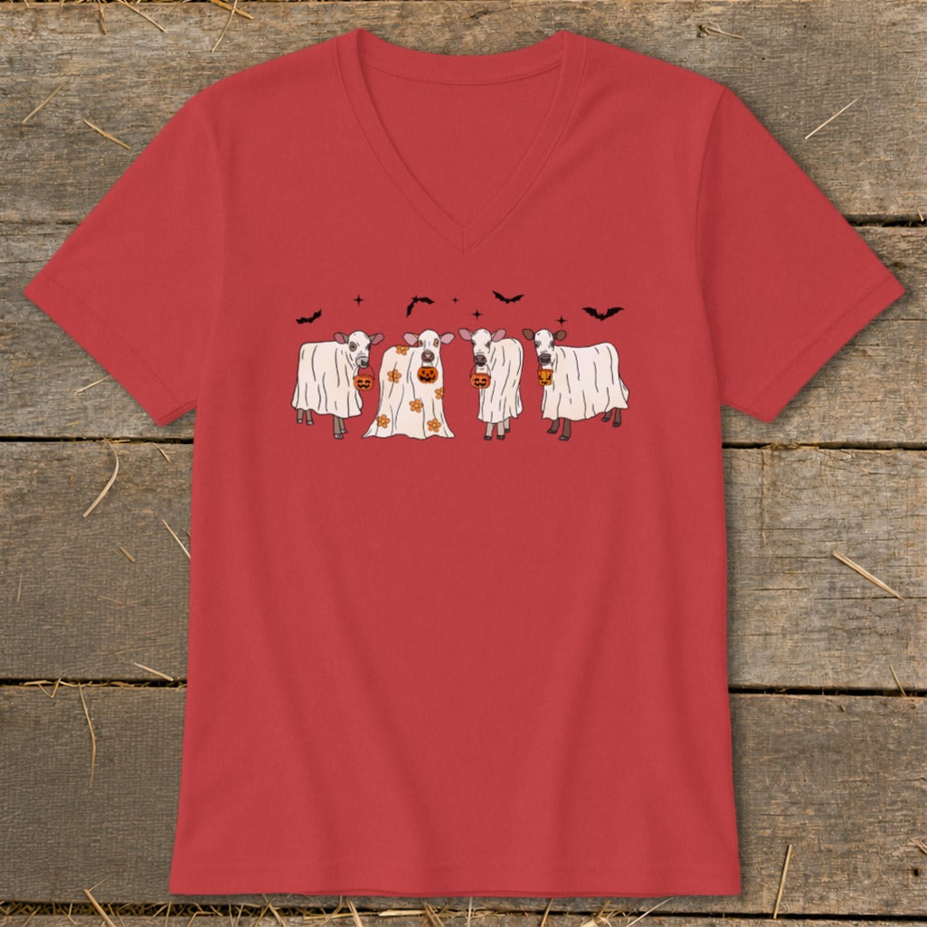 Four cows dressed as ghosts hold pumpkins on a red v-neck t-shirt.