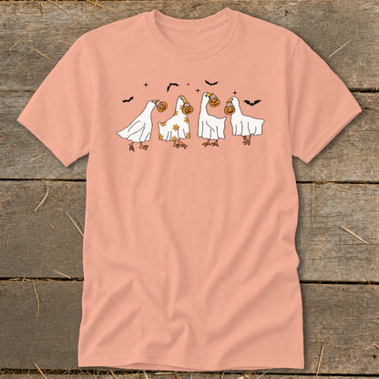 Four ducks in ghost costumes holding jack-o'-lanterns with bats flying above.