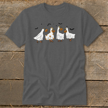 Four cartoon geese in white ghost costumes hold pumpkins on a dark gray t-shirt.
