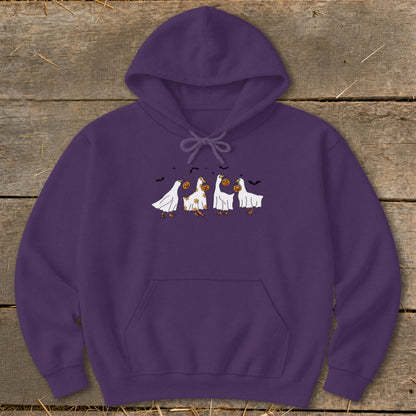 Purple hoodie with four cartoon geese dressed as ghosts holding pumpkins.