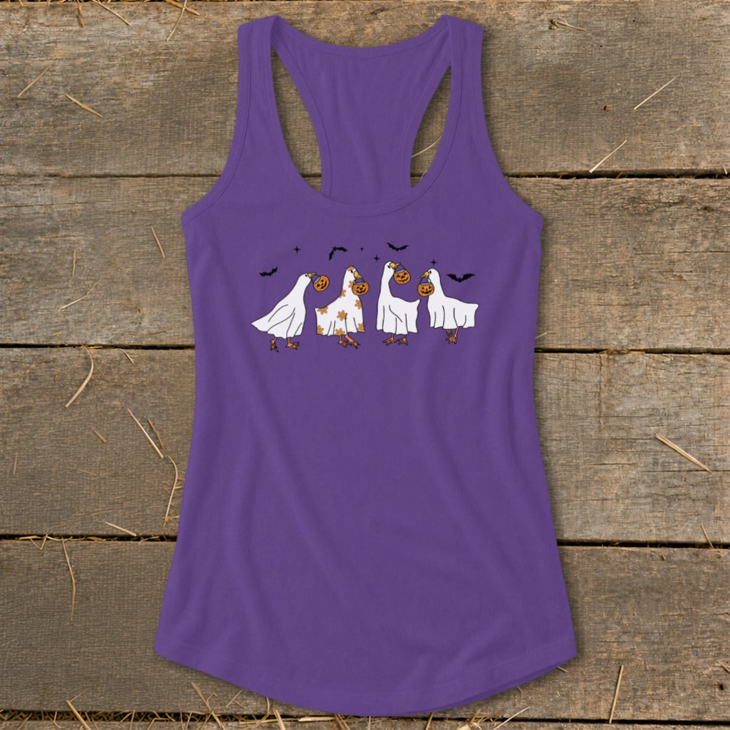 Purple tank top with a Halloween graphic of geese dressed as ghosts carrying pumpkins.