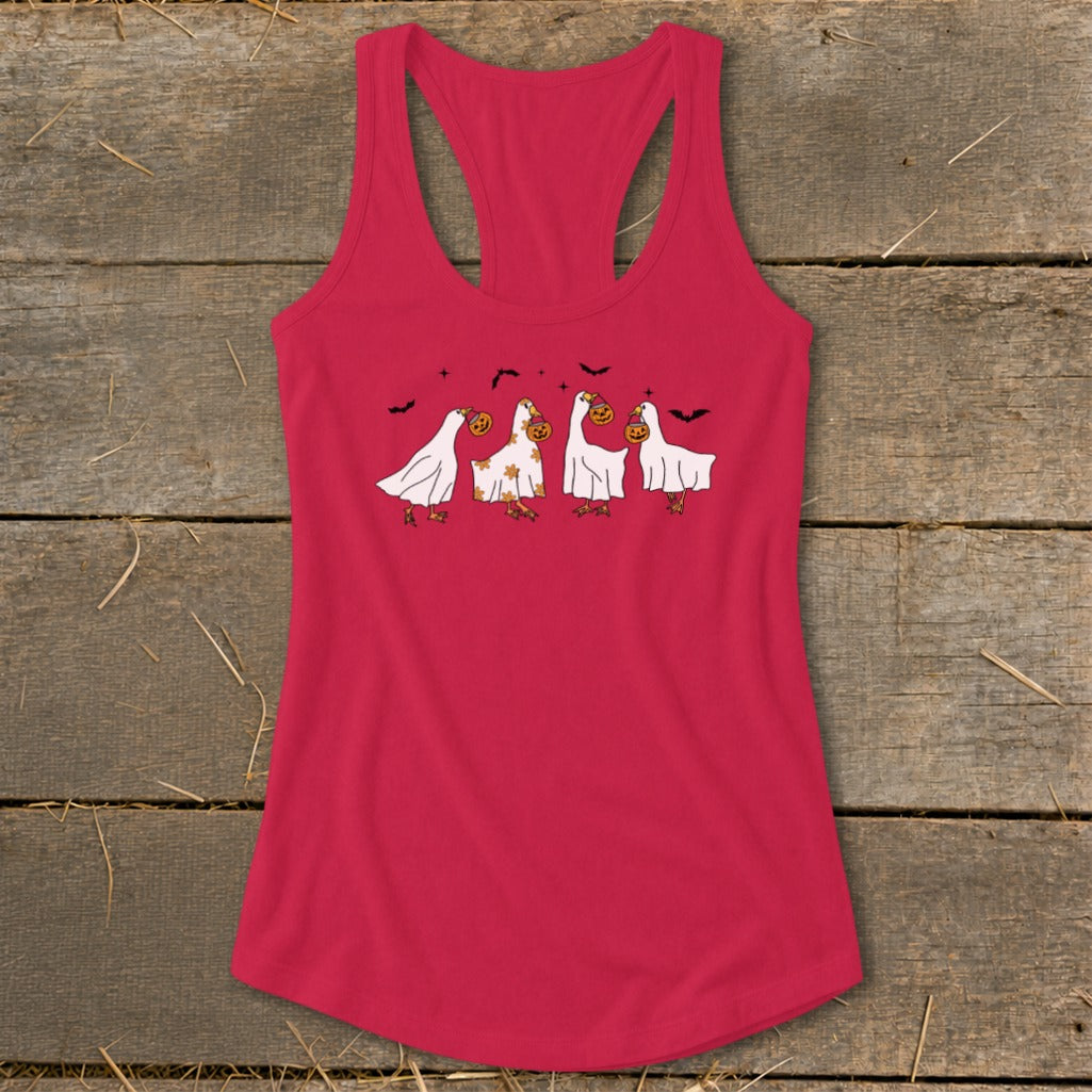 Pink tank top with cartoon ghosts holding pumpkins and bats.