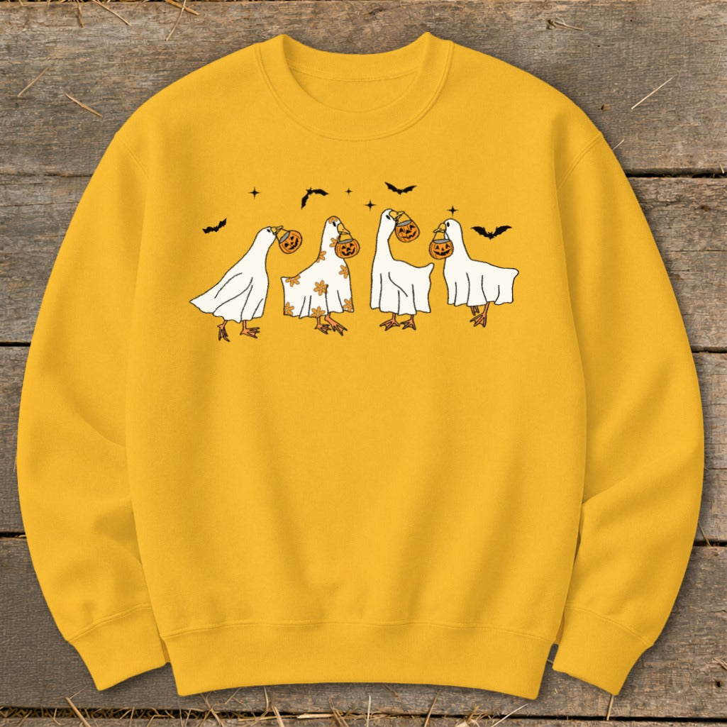 Yellow sweatshirt with a graphic of four ghost-like geese holding pumpkins and bats.