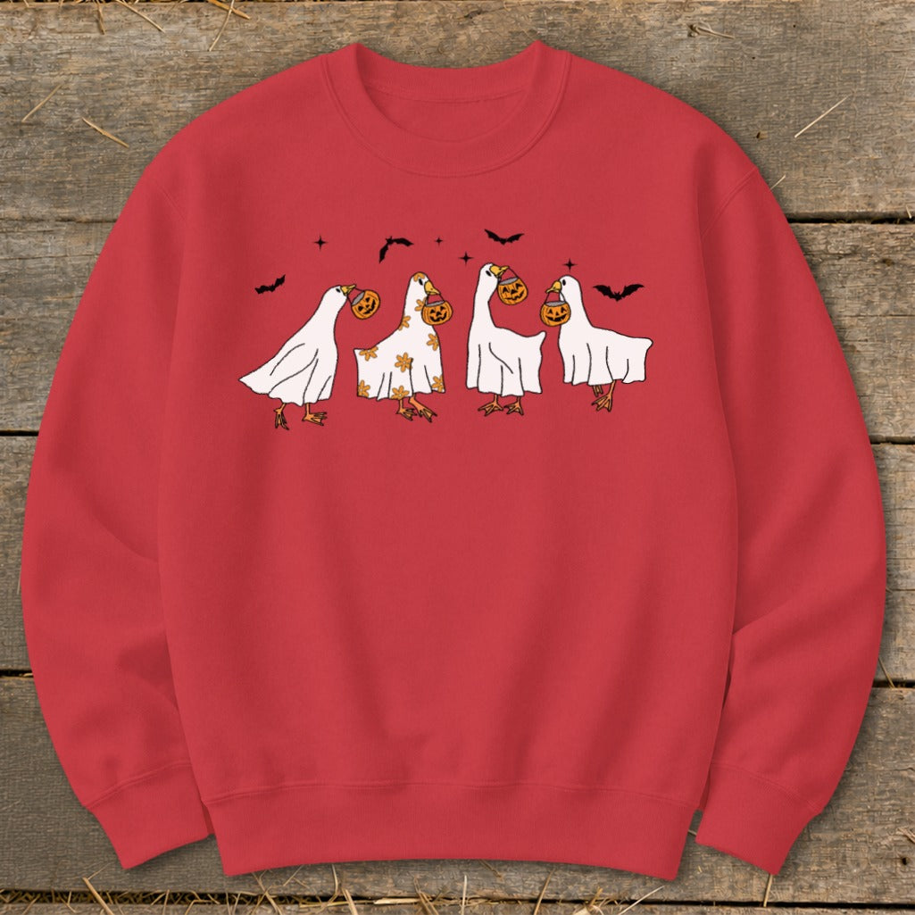 Red sweatshirt with four geese dressed as ghosts holding pumpkins.