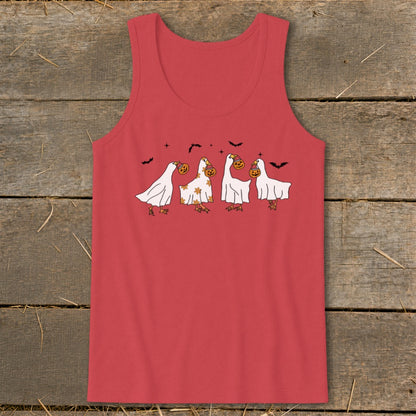 Four ducks dressed as ghosts with pumpkins and bats for Halloween.