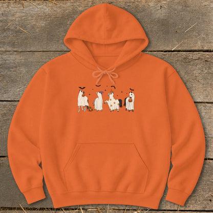 Orange hoodie with four cartoon horses in Halloween ghost costumes.