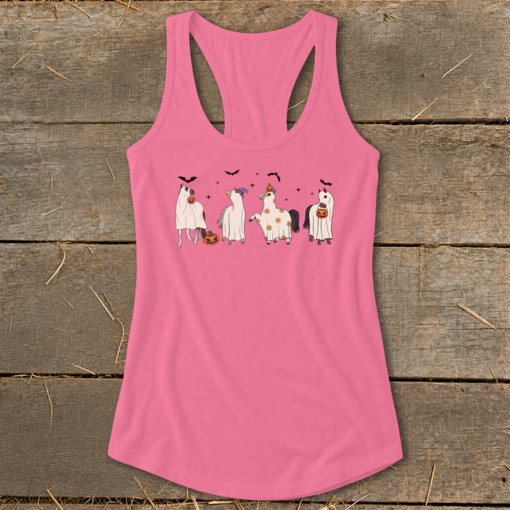 Pink tank top featuring four cartoon unicorns dressed as ghosts for Halloween.