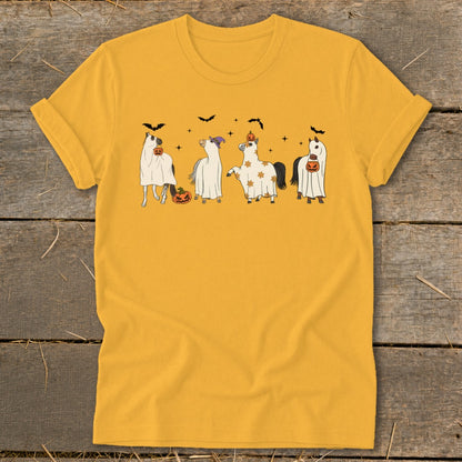 Four horses in ghost costumes with pumpkins and bats on a yellow t-shirt.