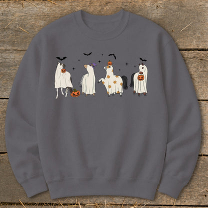 Four cartoon horses dressed in ghost costumes with pumpkins and bats for Halloween.