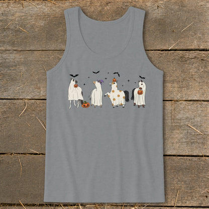 Four horses in Halloween costumes, including ghosts and pumpkins, against a dark background.
