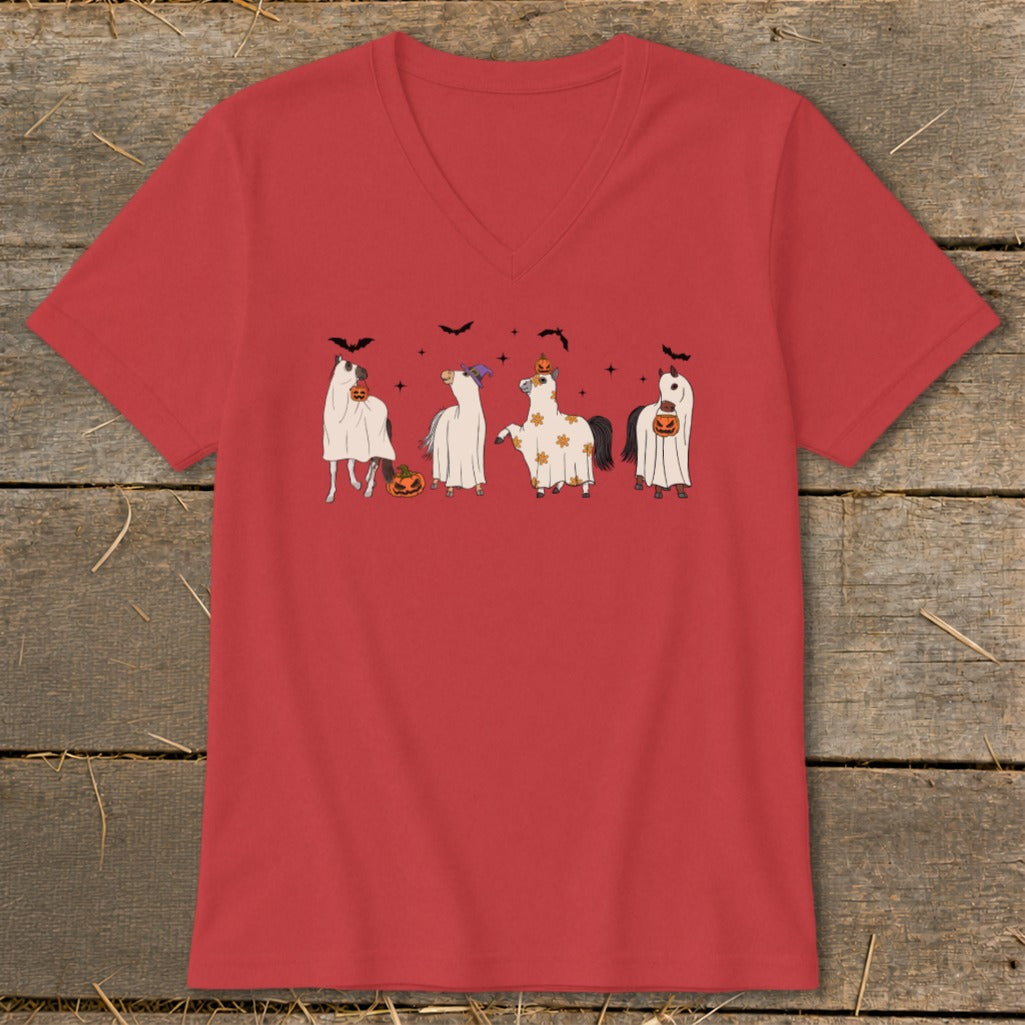 Four horses in Halloween ghost costumes with pumpkins and bats on a red v-neck shirt.