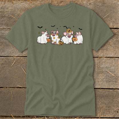 Four pigs in ghost costumes holding pumpkins with bats in the background.