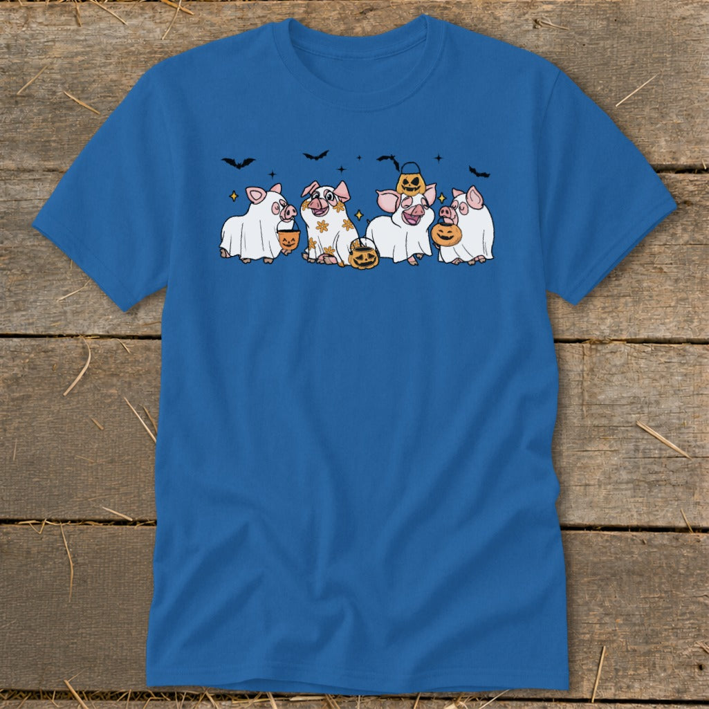Four pigs in ghost costumes holding candy buckets with pumpkins and bats.